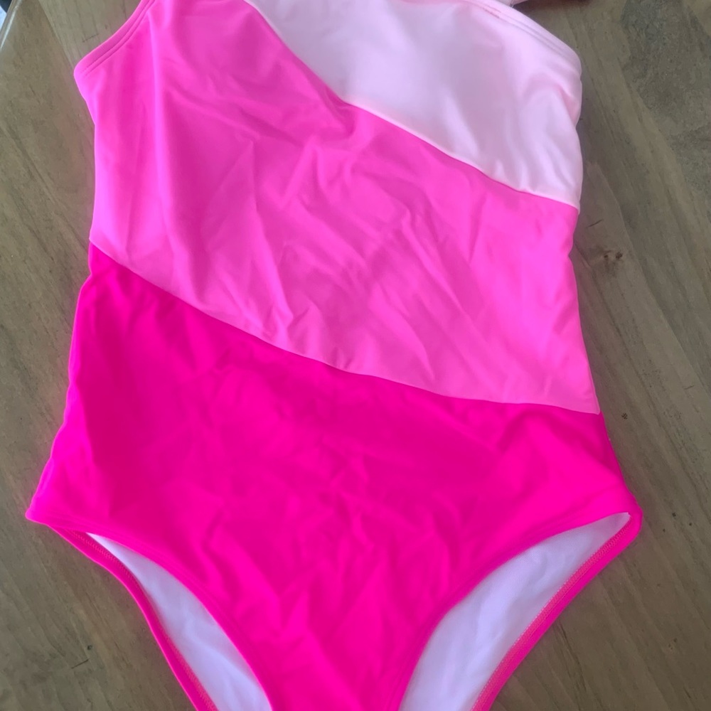 Beautiful pink SHEIN one piece bathing suit. Never been worn. Bought wrong size.